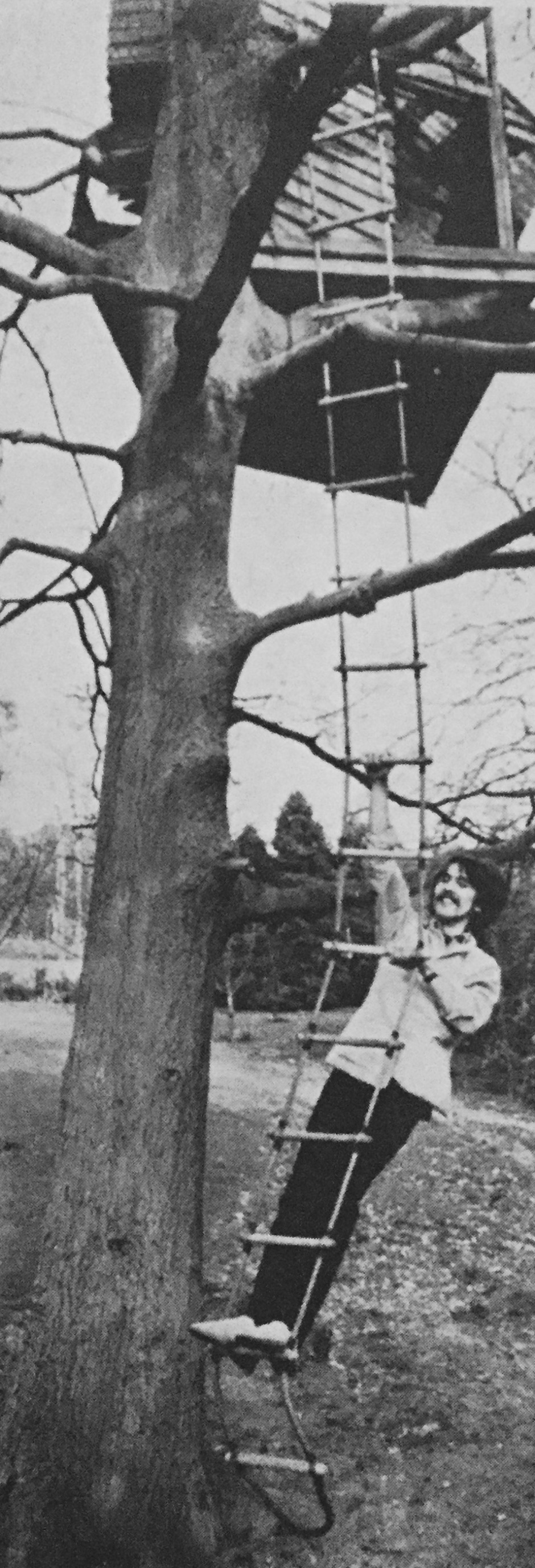 At Ringo's home, the Beatles social centre, George climbs up to the tree house where Ringo likes to sit and think.